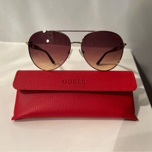 GUESS Women's Gradient Brown Aviator Sunglasses with Red Case